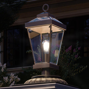 An Urban Ambiance lamp on top of a house, specifically the UQL1400 Casual Outdoor Post/Pier Light from the Bellingham Collection, measuring 22.5"H x