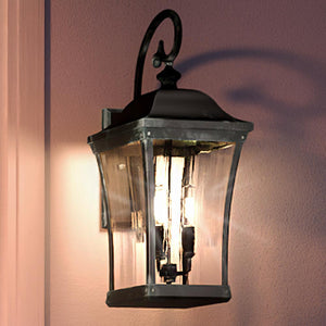 A unique UQL1421 Antique Outdoor Wall Light with two lights on it.