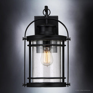 A beautiful UQL1431 Nautical Outdoor Wall Light with a unique clear glass bulb.