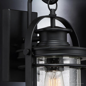 A beautiful UQL1431 Nautical Outdoor Wall Light with a unique clear glass bulb from Urban Ambiance.