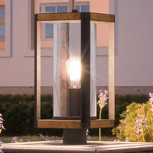 A gorgeous outdoor post light, 18.25"H x 8.25"W, with a light bulb in it from the Suffolk Collection by Urban Ambiance.