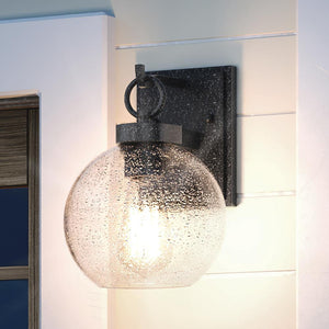An Urban Ambiance UQL1512 Contemporary Outdoor Wall Light with a gorgeous glass globe.