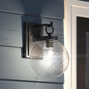 An UQL1513 Contemporary Outdoor Wall Light with a gorgeous glass globe from Urban Ambiance.