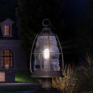 A beautiful house with a unique UQL1540 Nautical Outdoor Post/Pier Light, 19.25"H x 10"W, Black Sand Finish, Danbury Collection in front of