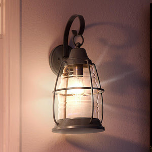 An Urban Ambiance wall lamp from the Danbury Collection adorns a luxurious room.