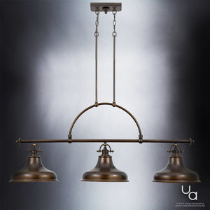 The Urban Ambiance UQL2285 Industrial Chandelier from the Sonoma Collection showcases industrial-inspired detailing with a Parisian Bronze finish. Measuring 23.5 inches high by 52.5 inches wide, this triple pendant fixture is suspended by two rods from a rectangular ceiling plate and set against a neutral gradient background.