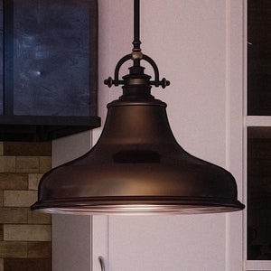 An Urban Ambiance pendant lighting fixture hanging over a kitchen island.