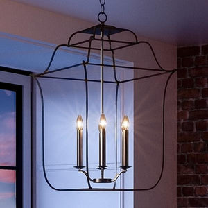 A unique Urban Ambiance UQL2322 Colonial Chandelier, 30"H x 22"W, Vintage Black Finish, Savannah Collection from a ceiling.