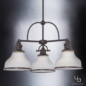 Showcased against a gradient background, the Urban Ambiance UQL2332 Industrial Chandelier from the Pasadena Collection features three opal etched glass shades and a Parisian Bronze-finished frame, measuring 15.5 inches high by 24 inches wide.