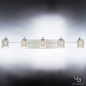 The Urban Ambiance Napa Collection UQL2407 Modern Bathroom Vanity Light features a polished chrome finish and five cylindrical, dual-layered glass shades arranged horizontally, casting a soft white glow.