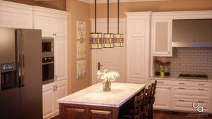 A modern kitchen features white cabinets, stainless steel appliances, an island topped with a marble countertop, a bouquet of flowers, and the Urban Ambiance UQL2433 Art Deco Hanging Pendant Light from the Genoa Collection—an eye-catching double-shaded fixture in a Copper Revival finish—illuminating the space above the island.