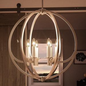 A luxury lighting fixture, the UQL2552 Globe Chandelier from the Denver Collection by Urban Ambiance, adds a gorgeous touch to any living room with its brushed nickel finish.