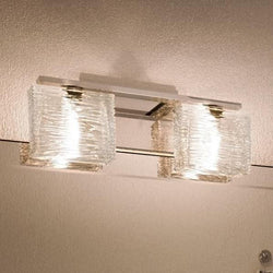 A unique UQL2721 Modern Bathroom Light fixture with a glass shade from Urban Ambiance.