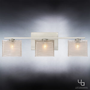 The Urban Ambiance UQL2722 Modern Bathroom Light from the San Diego Collection features a sleek brushed nickel finish, three wavy glass shades, and measures 6.75 inches high by 22.5 inches wide—perfect for adding beautiful illumination to your wall-mounted bath space.