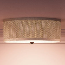 A beautiful Urban Ambiance UQL2740 Transitional Flush Ceiling Light with a white fabric shade.
