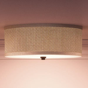 A beautiful Urban Ambiance UQL2740 Transitional Flush Ceiling Light with a white fabric shade.