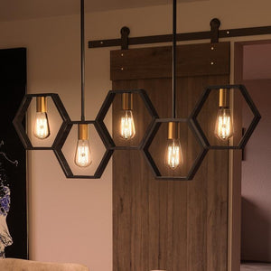 A living room with a unique Industrial Chandelier lighting fixture.