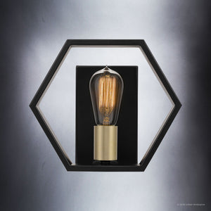 An Urban Ambiance UQL2773 Industrial Wall Sconce, a beautiful lighting fixture with a bulb in it.