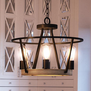 An Urban Ambiance UQL2813 Industrial Chandelier, 12.25"H x 17.5"W, Ash Black Finish from the Bergen Collection hanging in a kitchen with beautiful lighting fixture.
