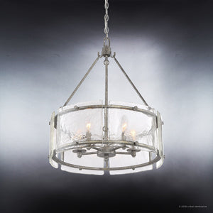 An UQL2872 Industrial Chandelier from the Nantes Collection by Urban Ambiance, with a gorgeous glass shade and unique metal frame.