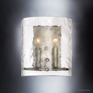 Blending rustic charm with contemporary elegance, the Urban Ambiance UQL2873 Industrial Wall Sconce from the Nantes Collection features a silver etch finish and a textured, semi-transparent glass cover that holds two candle-style bulbs, casting a gentle glow against any wall. Measuring 10″H x 8.75″W, this wall-mounted fixture brings modern sophistication to your space.