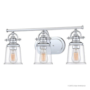 The Urban Ambiance UQL2881 Industrial Bathroom Vanity Light from the Salford Collection features a polished chrome finish, three clear glass shades with visible Edison-style bulbs, and is mounted on an oval backplate for a modern yet timeless appeal. Measuring 9.5 inches high by 23 inches wide, this fixture brings industrial elegance to your bathroom décor.