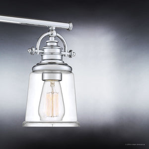 A unique lamp from the Salford Collection, featuring a gorgeous polished chrome finish and clear glass shade.