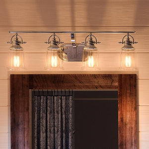 A unique Urban Ambiance bathroom light fixture with a wooden frame and glass jars.