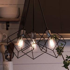 A kitchen with a unique lighting fixture, the Urban Ambiance UQL2912 Modern Chandelier from the Padova Collection, hanging from the ceiling.