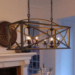 A beautiful UQL3002 Farmhouse Chandelier, 19.5"H x 40.75"W, Wood Grain Metal with Antique Black Finish from the Barnsley Collection by Urban Ambiance