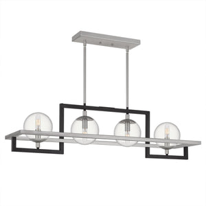 The UQL3241 Minimalist Chandelier from Urban Ambiance’s Odessa Collection features a modern geometric design with a rectangular black steel frame, four glass globe light bulbs, and two vertical rods connecting the fixture to the ceiling mount. Measuring 10.5″ high by 40″ wide, it comes in a natural black finish.