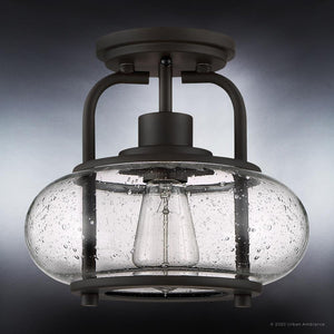 From the Clearwater Collection by Urban Ambiance, the UQL3271 Utilitarian Ceiling Light features a dark bronze frame and oversized clear seedy glass shades with vintage-inspired Edison bulbs, providing a timeless appeal. Size: 9.28