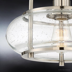 Close-up of the Urban Ambiance UQL3280 Utilitarian Ceiling Light from the Clearwater Collection, featuring a brushed nickel finish and a clear seeded glass flush mount shade with visible air bubbles and an exposed bulb; measures 10″H x 12″W.