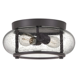 The Urban Ambiance UQL3291 Utilitarian Ceiling Light from the Clearwater Collection features a dark bronze frame with textured glass. Measuring 5.75