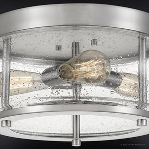 Close-up of the UQL3300 Utilitarian Ceiling Light from Urban Ambiance’s Clearwater Collection, featuring a brushed nickel finish, exposed bulbs, and a clear seeded glass shade with bubble-like textures—a perfect addition for modern farmhouse style.