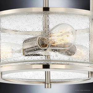 Close-up of the Urban Ambiance UQL3310 Utilitarian Ceiling Light from the Clearwater Collection, featuring a cylindrical seeded glass shade with a bubbled texture and three exposed bulbs, finished in brushed nickel.