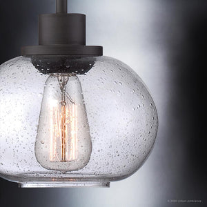 Close-up of Urban Ambiance's UQL3321 Utilitarian Pendant Light, featuring a vintage bulb within a clear, seedy glass shade, part of the Clearwater Collection.