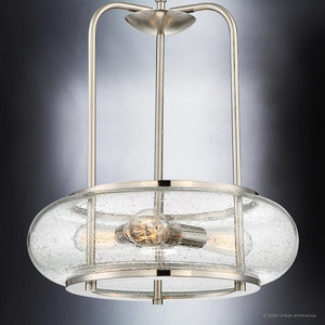 A unique UQL3340 Utilitarian Chandelier from Urban Ambiance with a clear glass shade.