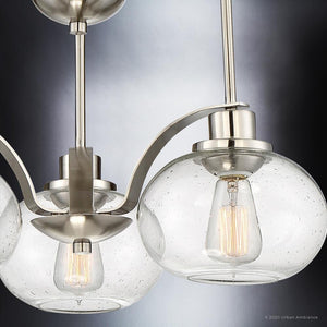 Three beautiful UQL3350 Utilitarian chandelier with clear glass globes from the Urban Ambiance Clearwater Collection.