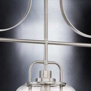 A stunning UQL3380 Utilitarian Chandelier by Urban Ambiance, featuring a glass shade and metal frame, perfect for luxury lighting.