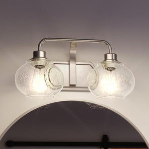 An Urban Ambiance bathroom light fixture with two UQL3401 Utilitarian Bath Vanity Lights, 8.25"H x 17.5"W, Brushed Nickel Finish, Clearwater Collection glass