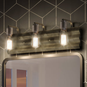 A beautiful bathroom with a mirror and three Urban Ambiance UQL3430 Rustic Bath Vanity Lights, 7"H x 23"W, Warm Bronze Finish, Centennial Collection.