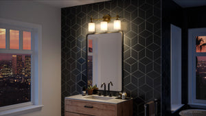 A beautiful bathroom with a UQL3491 Mid-Century Modern Bath Vanity Light and a sink and a mirror.