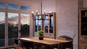 A dining room with a UQL3806 Modern Farmhouse Chandelier 26''H x 28''W, Matte Black Finish, Bideford Collection by Urban Ambiance table and chairs.