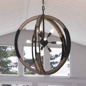 An Urban Ambiance beautiful circular lamp hanging over a window in a living room.