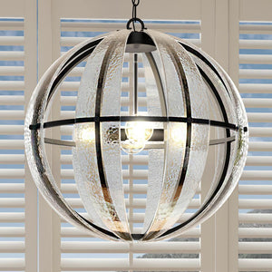 A beautiful UQL3140 Art Deco Chandelier with a Matte Black Finish from the Provo Collection by Urban Ambiance is hanging above a window.