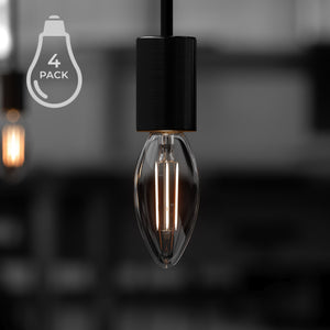 A beautiful black and white photo of a unique UBB2041 Luxury LED Bulbs lighting fixture hanging in a dark room.