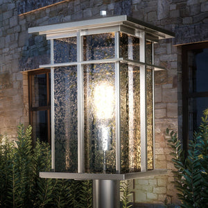 A unique and luxury lighting fixture, the UEX1005 Craftsman Outdoor Post Light 17''H x 9''W combines a burnished aluminum finish with a glass shade from the Milwaukee Collection