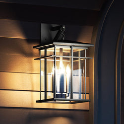 A unique high-end Urban Ambiance UEX1006 Craftsman Outdoor Wall Sconce 17''H x 9''W, Matte Black Finish, Milwaukee Collection on a wooden wall