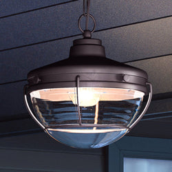 A gorgeous Nautical Outdoor Pendant, part of the Telluride Collection, hanging from the ceiling of a house.